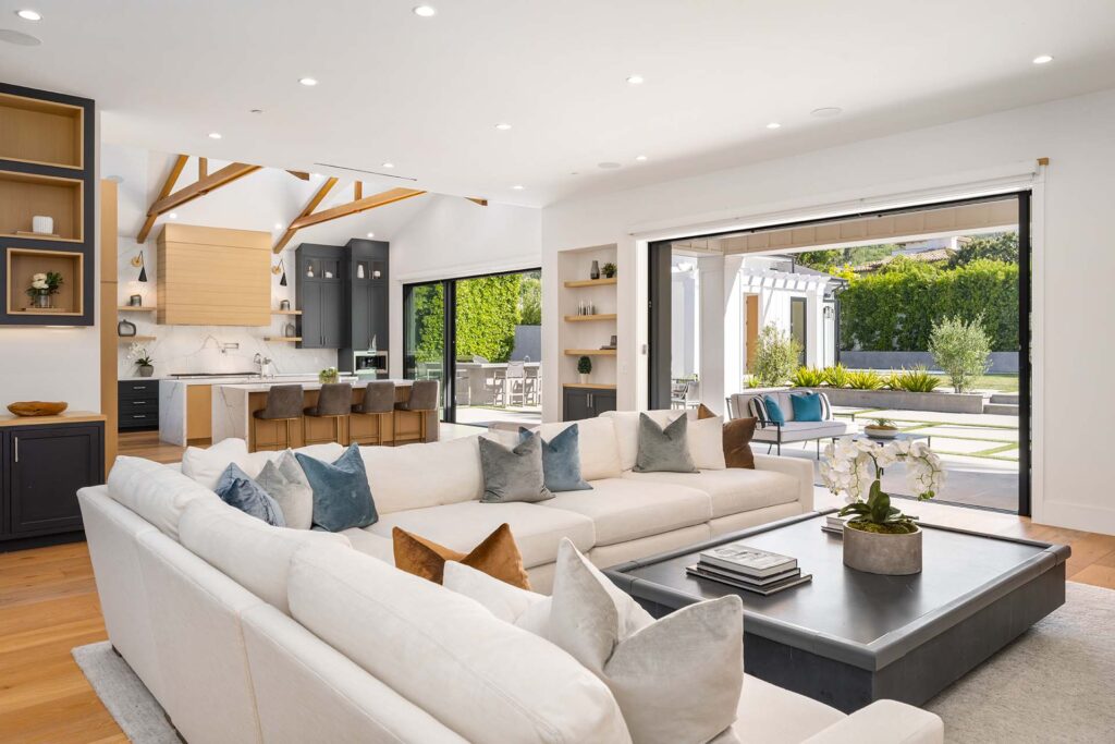 Modern open living room designed through full-service interior design services, combining comfort, function, and timeless beauty.